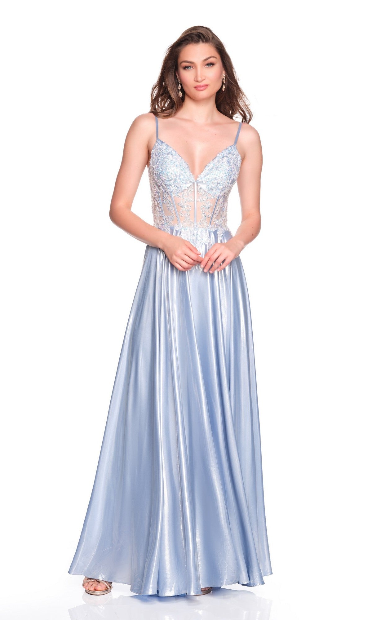 A woman models the Dave and Johnny 12631 long prom dress—light blue, sleeveless, with a fitted embroidered corset bodice, thin straps, and an elegant A-line satin skirt—posed against a white background.